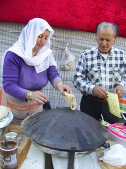 Druze pitas baked on a street of Wadi Nisnas