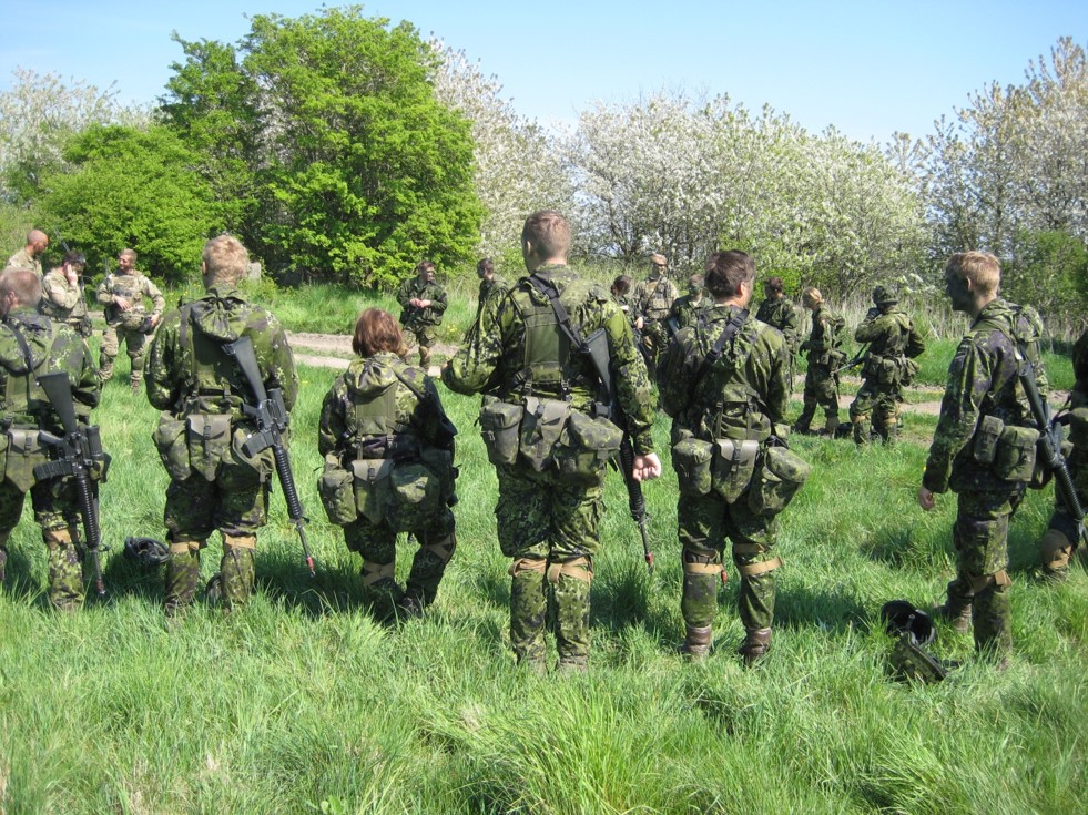 Soldiers standing in a relaxed manner