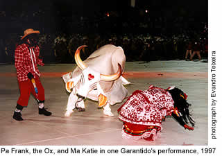 Pa Frank, the Ox, and Ma Katie in one Garantido's performance, 1997