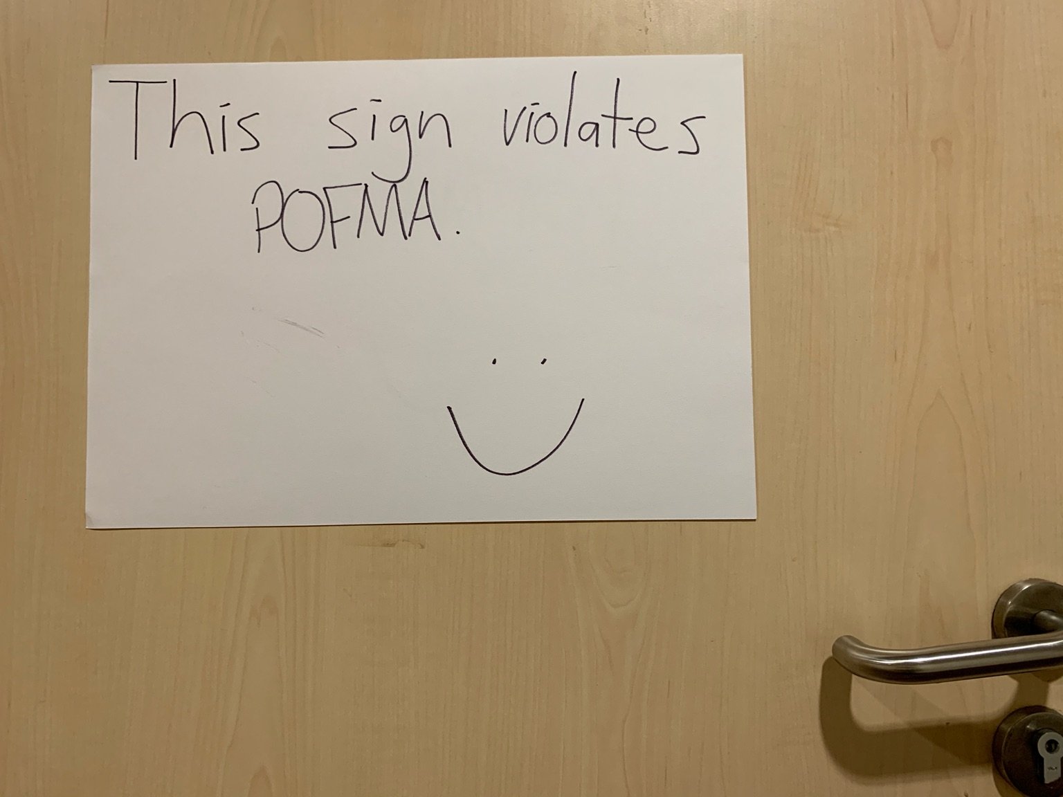 This sign violates POFMA.