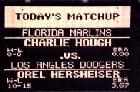 Thumbnail Pic of Florida's scoreboard showing the pitching matchup of Hough versus Hershiser for the first game in franchise history